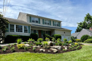 home with beautifully landscaped native plantings